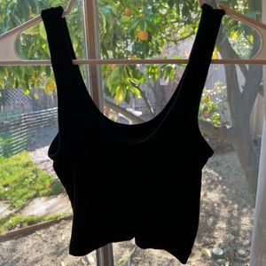 Urban Outfitters out from under tank top